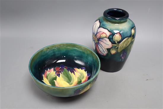 A Moorcroft leaf and berry bowl and a Clematis pattern vase, height 15cm
